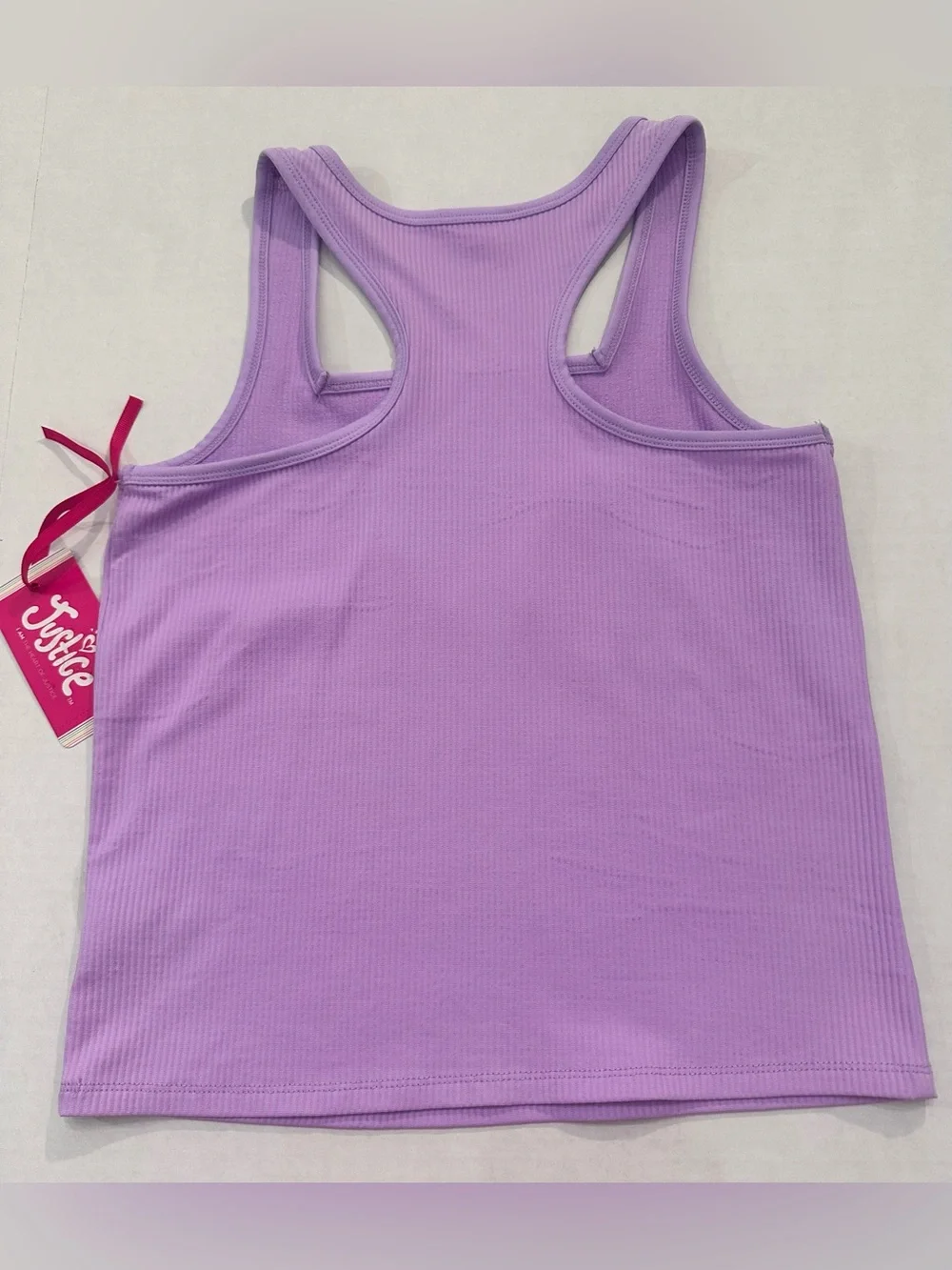 Justice Girls Lilac Butterfly Tank Top and a Pair of Justice Beach Board Shorts